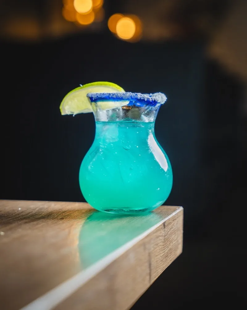 A margarita in a hand-blown pitcher at El Molcajete